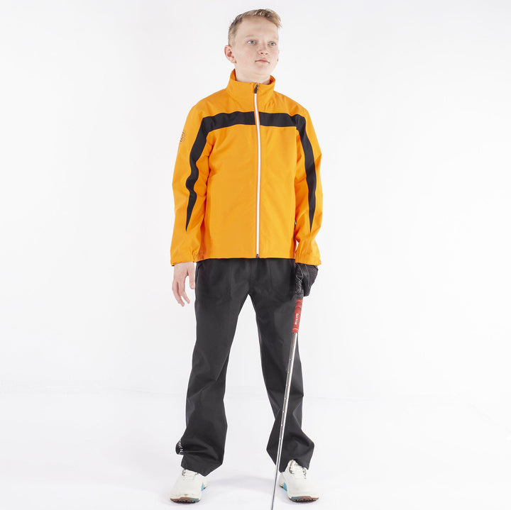 Robert is a Waterproof golf jacket for Juniors in the color Orange(1)