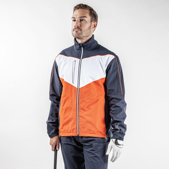 Armstrong is a Waterproof golf jacket for Men in the color Navy/White/Orange (1)