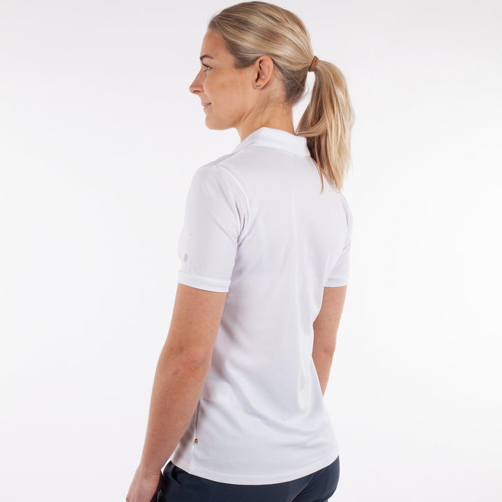 Mireya is a Breathable short sleeve golf shirt for Women in the color White(4)