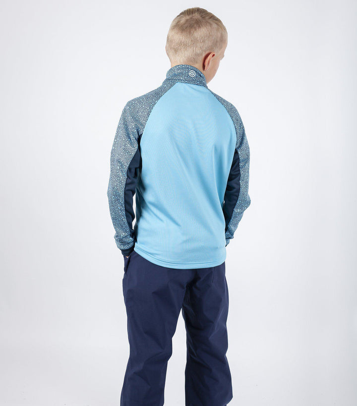 Rick is a Insulating golf mid layer for Juniors in the color Blue Bell(5)