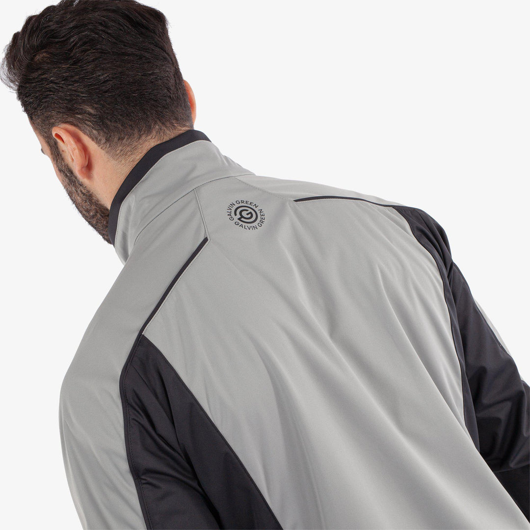 Lyndon is a Windproof and water repellent golf jacket for Men in the color Sharkskin/Black(6)