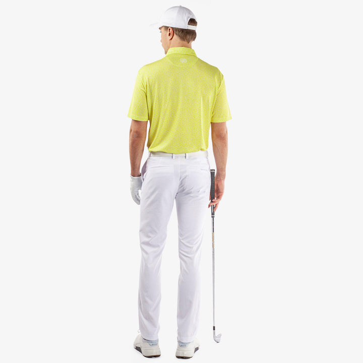 Mani is a Breathable short sleeve golf shirt for Men in the color Sunny Lime(7)