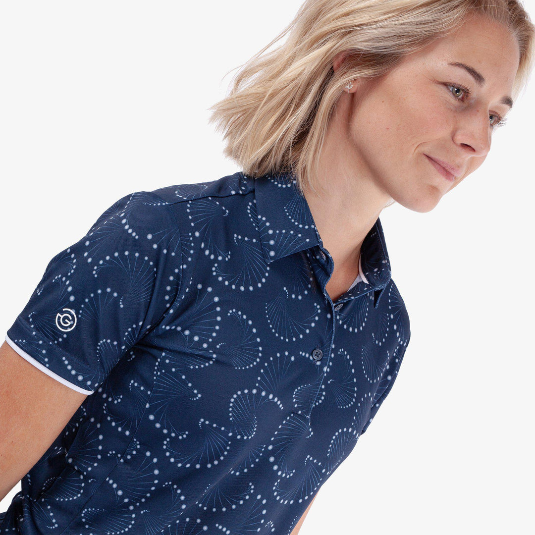 Mandy is a Breathable short sleeve golf shirt for Women in the color Navy/White(3)
