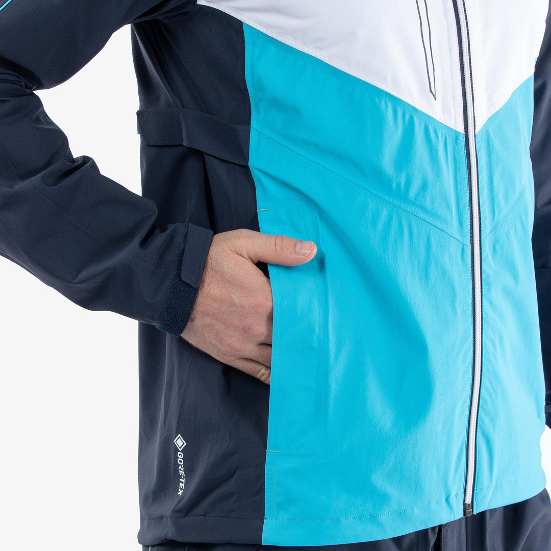 Armstrong is a Waterproof golf jacket for Men in the color Navy/Aqua/White(4)
