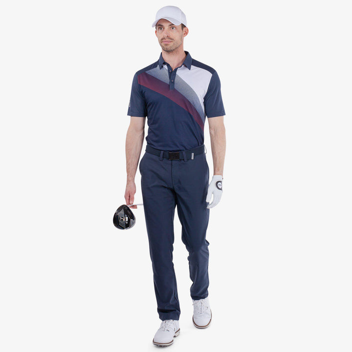 Macoy is a Breathable short sleeve golf shirt for Men in the color Navy/Red(2)