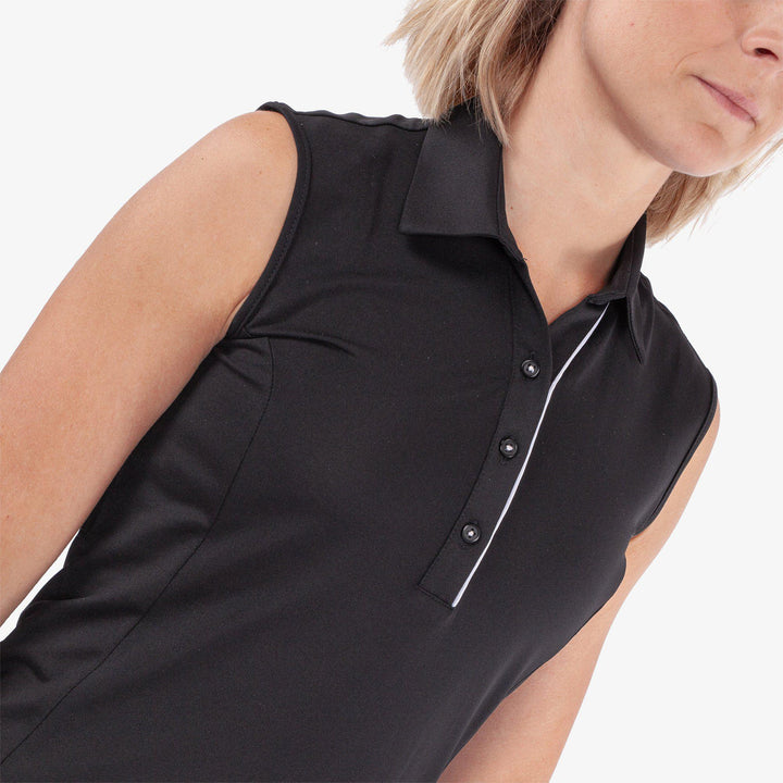 Meg is a Breathable short sleeve golf shirt for Women in the color Black/White(3)