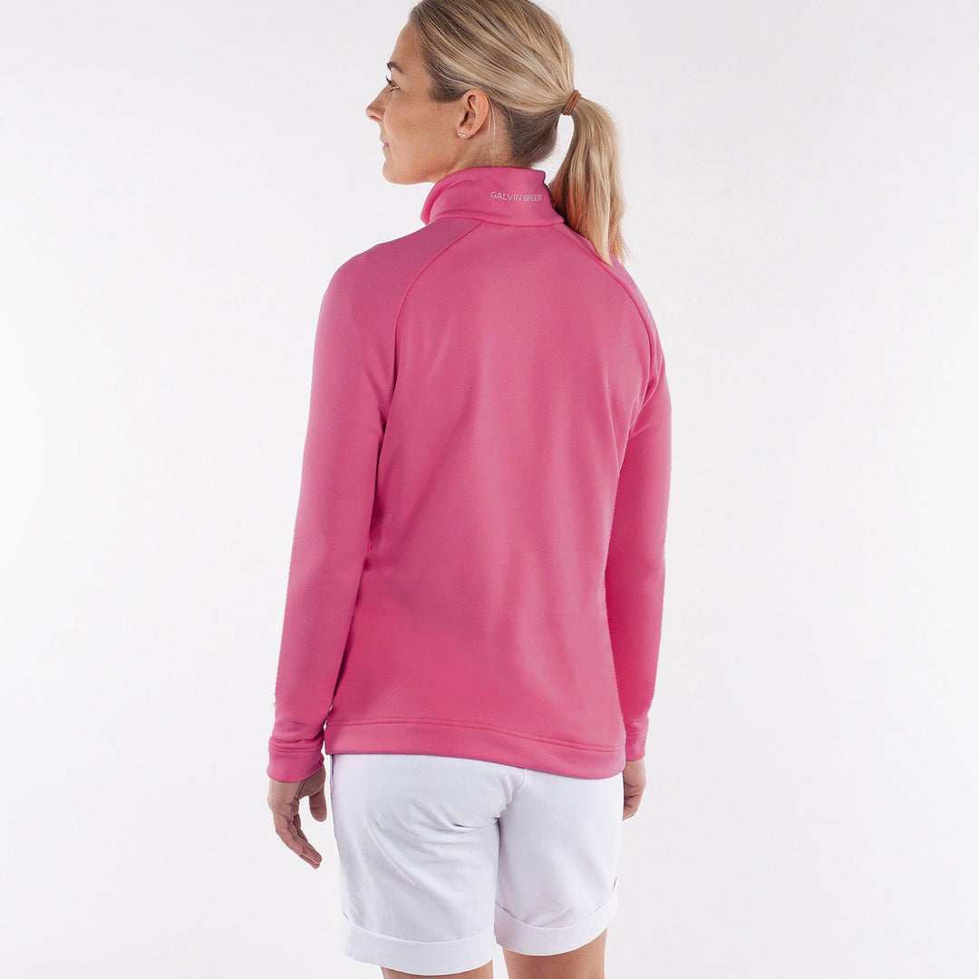 Dolly Upcycled is a Insulating golf mid layer for Women in the color Sugar Coral(4)