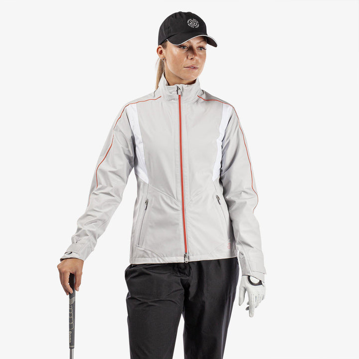 Ally is a Waterproof golf jacket for Women in the color Cool Grey/White/Coral(1)