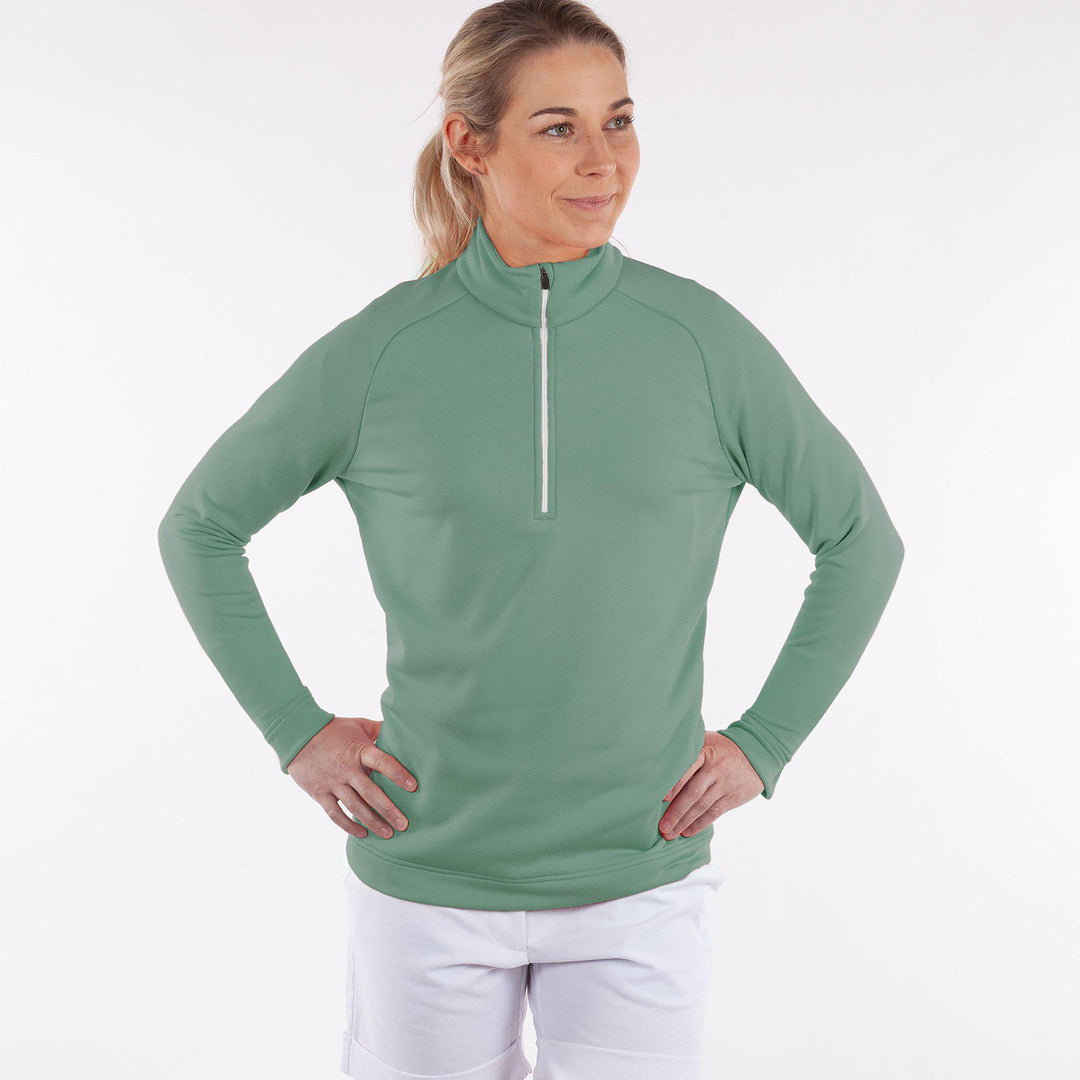 Dolly Upcycled is a Insulating golf mid layer for Women in the color Golf Green(1)