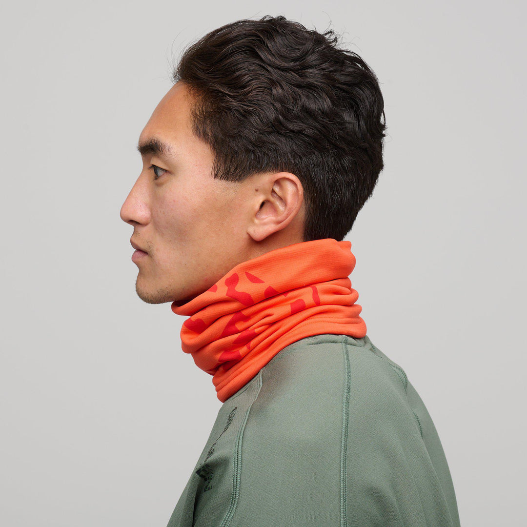 Derek is a Insulatin neck warmer in the color Orange(3)