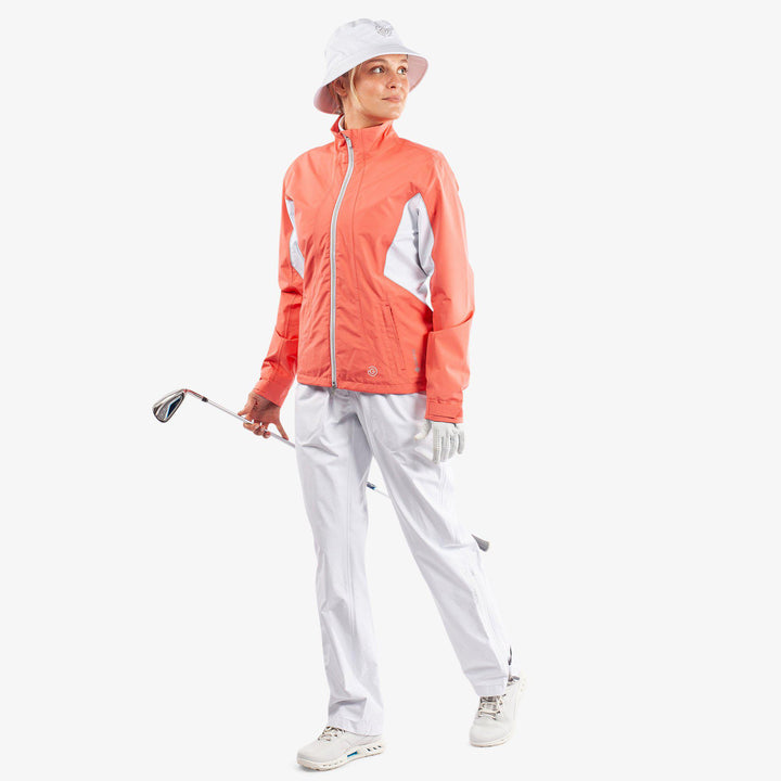 Aida is a Waterproof golf jacket for Women in the color Coral/White/Cool Grey(2)