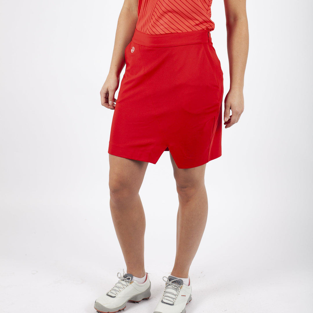 Masey is a Breathable golf skirt with inner shorts for Women in the color Red(1)