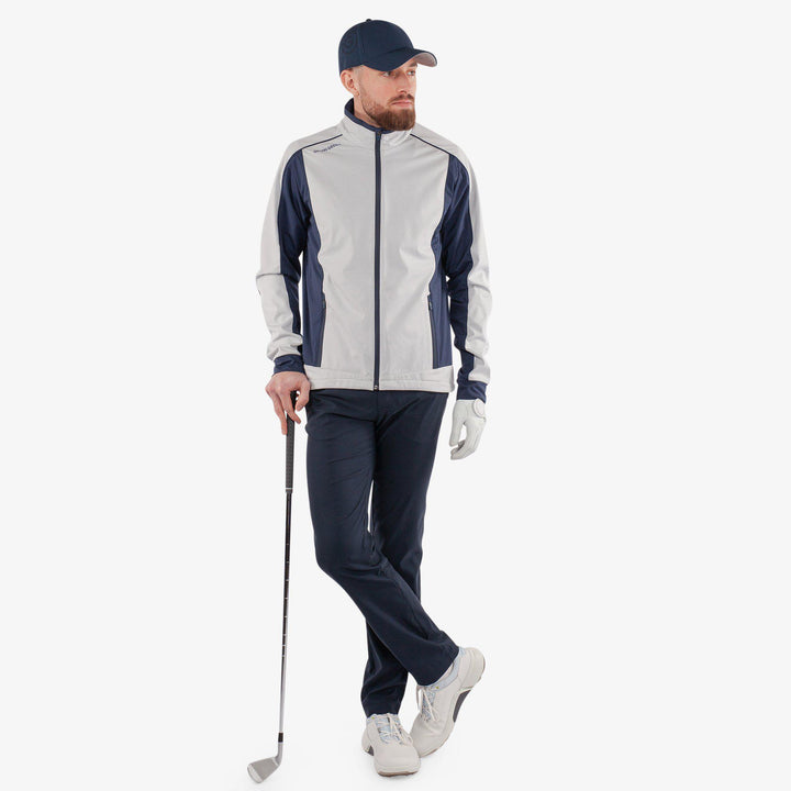 Lyndon is a Windproof and water repellent golf jacket for Men in the color Cool Grey/Navy(2)