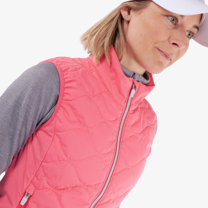 Lucille is a Windproof and water repellent golf vest for Women in the color Camelia Rose(3)