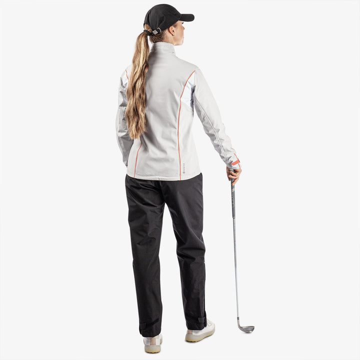 Ally is a Waterproof golf jacket for Women in the color Cool Grey/White/Coral(7)